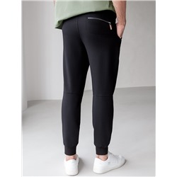 Брюки из тонкого футера с карманом на молнии