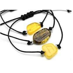 Браслет с Руной Уруз из янтаря 10*17мм на шнурке цв.медово-зеленый