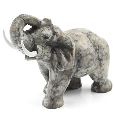 Скульптура из кальцита "Слон идущий" 130*65*110мм.