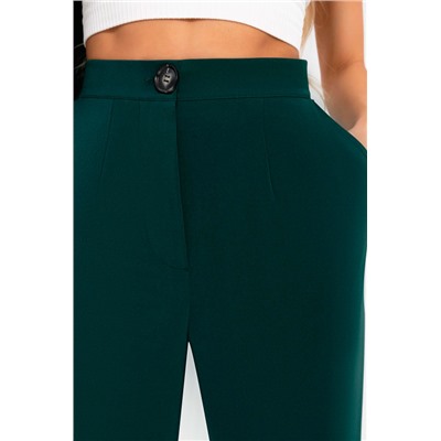 Зелёные брюки с карманами